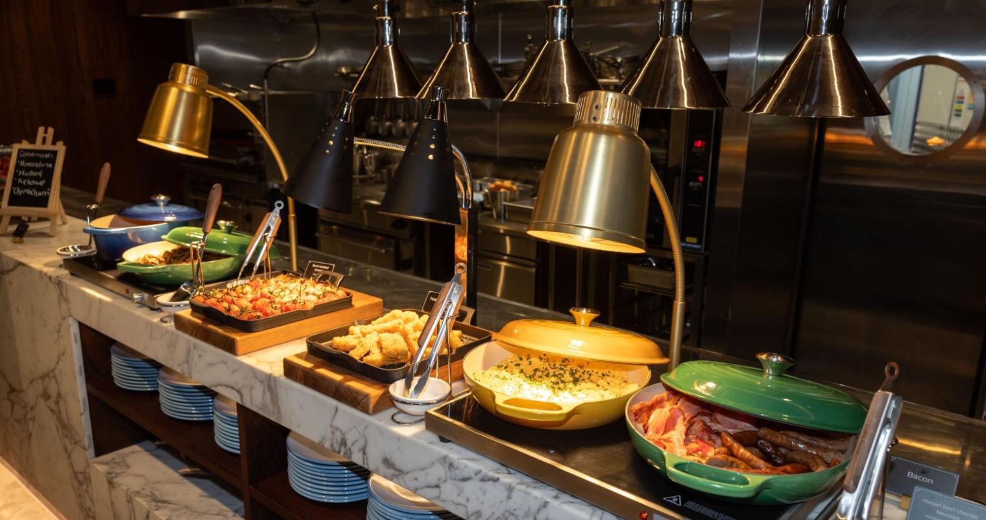 Horizon By Skycity Auckland Zewnętrze zdjęcie A chafing dish buffet